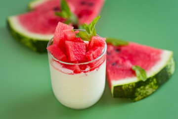 Bright watermelon pieces with morning yogurt
