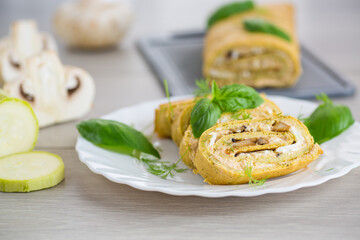 Hearty zucchini roll with piquant filling