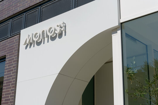exterior building facade and sign of Monos, a luggage store, located at 111 Ossington Av, Toronto