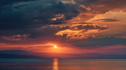 Fototapeta premium Sunset over lake with dramatic cloudscape