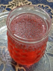 red caviar in glass jar
