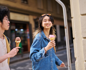 Portrait of a smiling couple in the city, tourists visiting destination, summer trip exploring and...