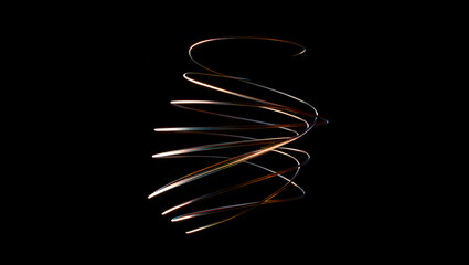Abstract spiral of light trails on black background