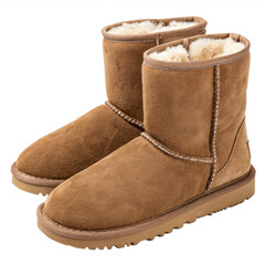 Pair of brown UGG style winter boots, isolated PNG transparent background
