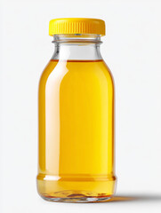 Refreshing apple juice in a  transparent bottle with a yellow cap on a white background