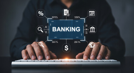 A person is typing on a keyboard with a digital banking interface in front of them