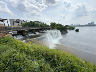 A waterfall falling into a river