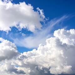 Fototapeta premium Cumulus clouds against a vibrant blue sky (1)