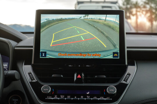 Car rear view monitor screen in reverse mode