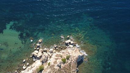 Majestic Aerial Views of Serene Sea and Rugged Coastline