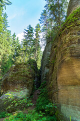 Adrspach, Czech Republic - 20.07.2025: View of the Adrspach-Teplice Rocks with Lake Piskovna. Forest and rocks.