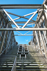 Architecture with steel stairs and wooden elements. Route up the observation tower