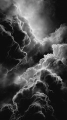 Dramatic black and white cloudscape abstract with soft illumination.