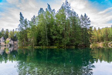 Adrspach, Czech Republic - 20.07.2025: View of the Adrspach-Teplice Rocks with Lake Piskovna. Forest and rocks.