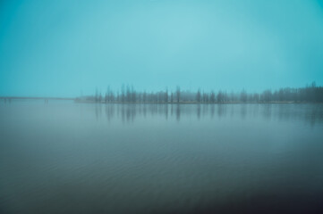 Fototapeta premium The photo showcases the beautiful scenery on both sides of the Lake Burley Griffin