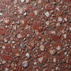 Natural stone background. A full-screen close-up texture of a red conglomerate (gravelite) with white and green grains.