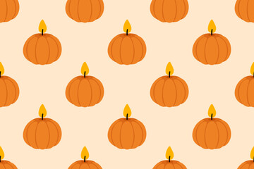 Orange pumpkin-shaped candles in cozy fall repeating design