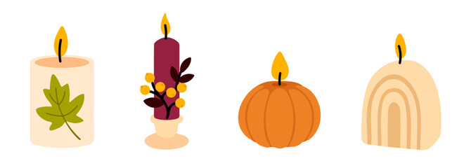 Set of fall-themed decorative candles with pumpkin, rainbow shape and seasonal foliage