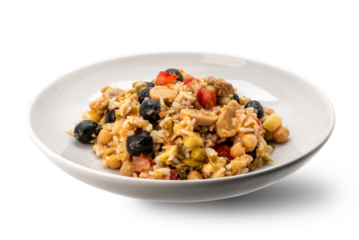 Rice salad topped with olives, mushrooms, tomatoes, and chickpeas on a white plate isolated