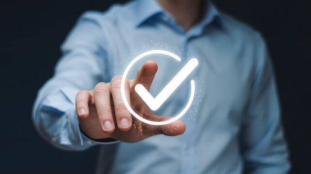 Confident businessman confirms success with glowing checkmark interface, symbolizing achievement and digital validation.