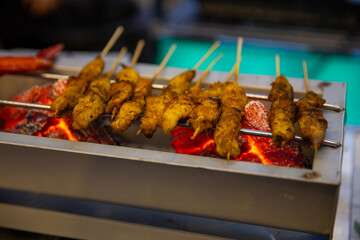 Chicken Satay on the grill