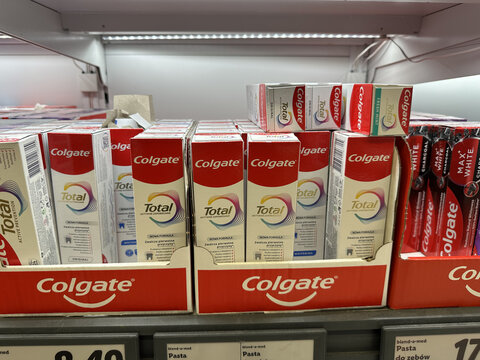 Warsaw, Poland - June 27, 2025: Colgate toothpaste products neatly arranged on store shelf, showcasing various types and packaging for effective oral care solutions