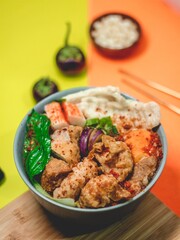 Cuanki Served with Lime and Green Garnish