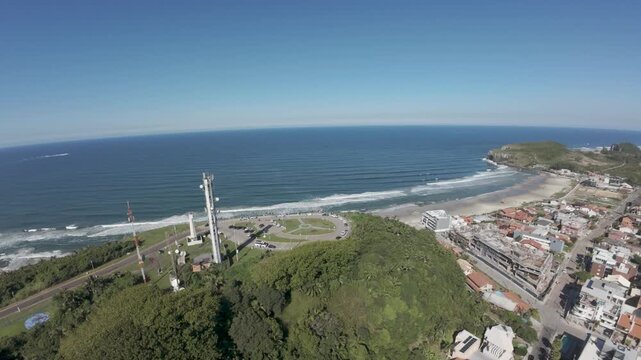 View of Cal beach between Morro do Farol and Morro da Guarita in Torres, Rio Grande do Sul, Brazil