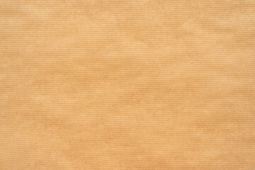 Flat, seamless brown kraft paper texture with subtle horizontal lines. Suitable for design projects, packaging mockups, or backgrounds