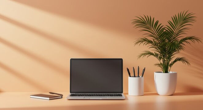 Clean minimalist workspace featuring laptop plant and notepad perfect for modern business and creative professionals