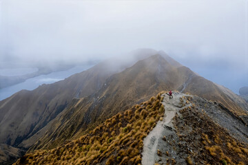 Roy's Peak lookout overlooking Lake Wanaka in Wanaka, New Zealand on a cloudy winter day