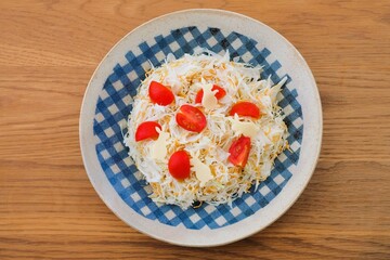 rabbit shaped slice cheese and fried noodle salad
