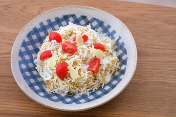 rabbit shaped slice cheese and fried noodle salad
