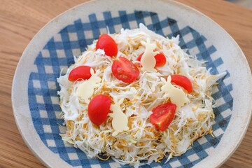 rabbit shaped slice cheese and fried noodle salad
