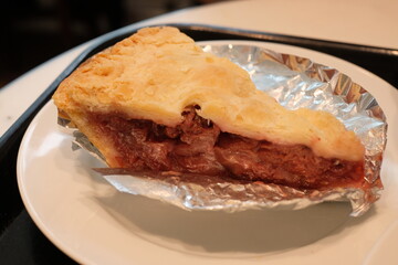 piece of cherry pie on a plate