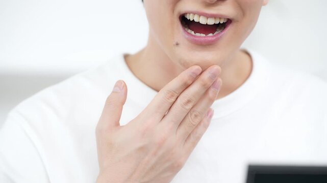 A man who enjoys his white teeth and beautiful skin