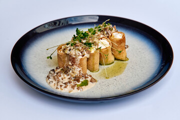 Deliciously Plated Culinary Creation Featuring Savory Mushroom-Filled Rolls Garnished with Fresh...