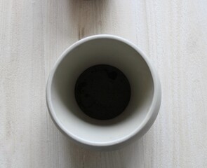 Round vase on coffee table view from up 