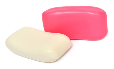 Two bars of white and pink soap isolated on white background