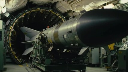 Tomahawk Cruise Missile (BGM-109) Being Loaded into a Submarine Launch System