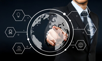 Businessman Using Digital Touchscreen Interface with Global Connections and Technology Icons Representing Innovation and Data Analysis in Corporate Environment