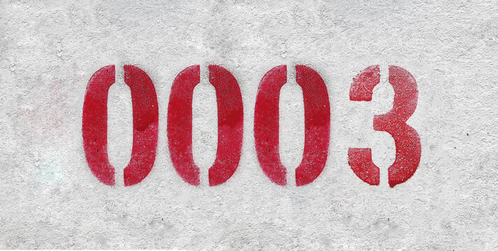 Red Number 0003 on the white wall. Spray paint.