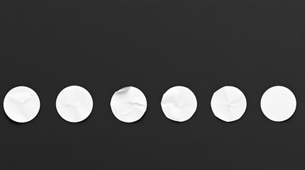 glued sticker mockup. round stickers set collection. realistic wrinkled surface of adhesive paper on black background. blank space for creative design.