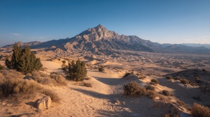 Spectacular mountain landscape scenery with desert and clear blue sky backdrop
