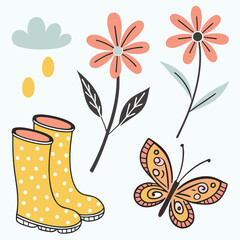 Yellow polka dot rain boots with flowers and butterfly