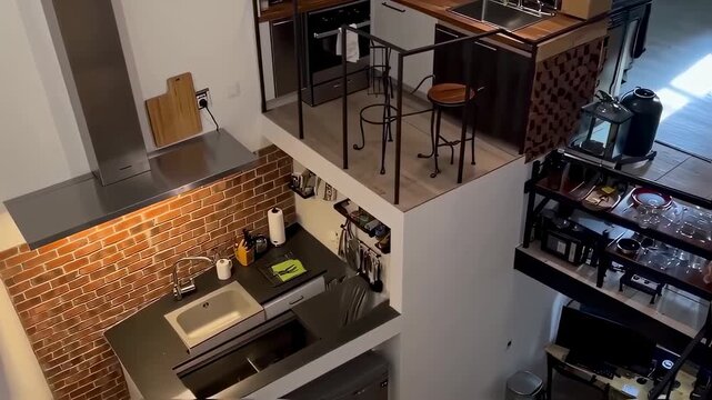 Modern Loft Apartment Interior Design with Open Kitchen and Mezzanine Dining Area