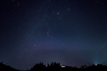 Obraz premium Starry sky in winter countryside