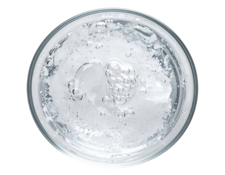 Clear face gel with air bubbles in round glass container, top view on isolated background