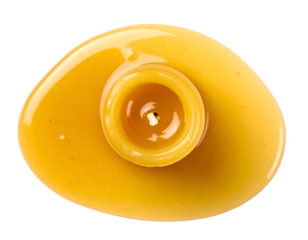 Top view of burned yellow candle with melted wax forming a round pool on isolated background