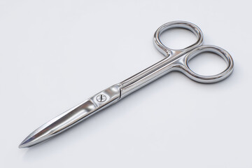 Close up of surgical scissors with a white background